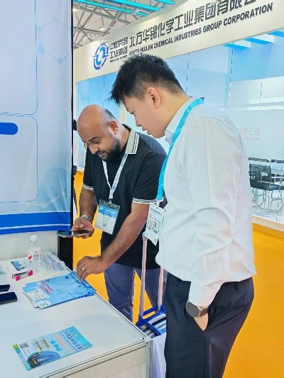 Sinoright team discussing chemical products with visitors at ICIF China 2026 Sinoright team discussing chemical products with visitors at ICIF China 2026